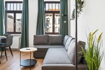 Ein Sitzbereich in der Unterkunft Bernhards Apartment Flurschützstraße