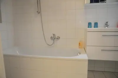 Ein Badezimmer in der Unterkunft Completely Renovated Apartment Top 16 - Easy Self Check in