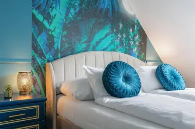 Ein Bett oder Betten in einem Zimmer der Unterkunft Luxury Loft View - 4BR - Gym - Parking - near Centre - Schönbrun