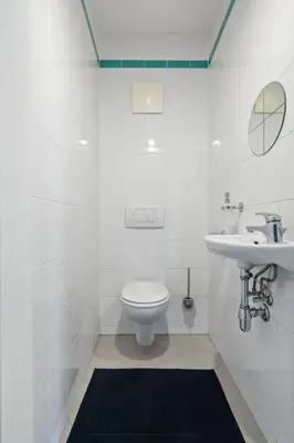 Ein Badezimmer in der Unterkunft Luxury Loft View - 4BR - Gym - Parking - near Centre - Schönbrun