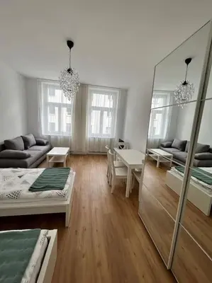 Ein Bett oder Betten in einem Zimmer der Unterkunft Herzgasse