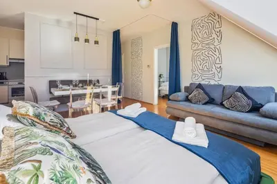 Ein Bett oder Betten in einem Zimmer der Unterkunft Green Dream Apartment - 3BR - Gym - Parking - Rooftop - Terrace