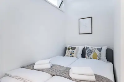 Ein Bett oder Betten in einem Zimmer der Unterkunft Cozy Studio 5min to Center by HM