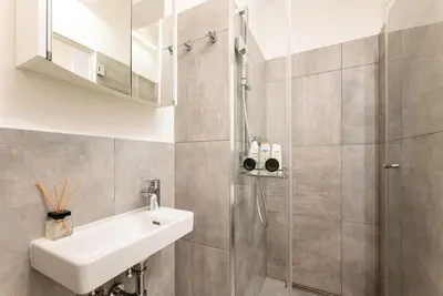 Ein Badezimmer in der Unterkunft Cozy Studio 5min to Center by HM