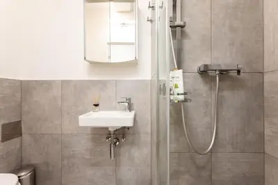 Ein Badezimmer in der Unterkunft Cozy Studio 5min to Center by HM
