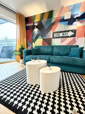 Ein Sitzbereich in der Unterkunft Kreative Wohnung mit Balkon