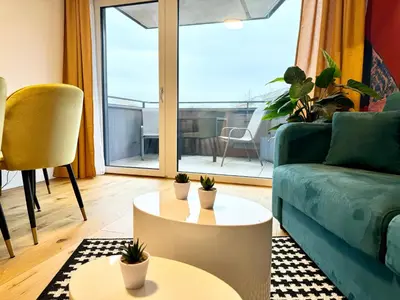 Ein Sitzbereich in der Unterkunft Kreative Wohnung mit Balkon