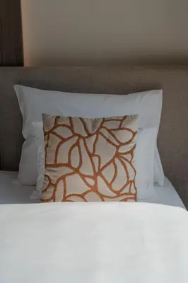 Ein Bett oder Betten in einem Zimmer der Unterkunft House of Ble