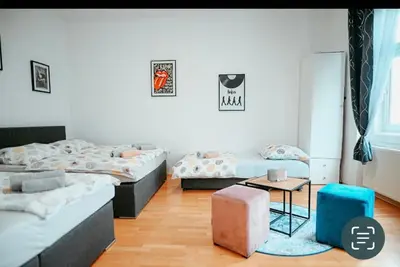 Ein Bett oder Betten in einem Zimmer der Unterkunft Raimond Apartment Top 27
