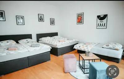 Ein Bett oder Betten in einem Zimmer der Unterkunft Raimond Apartment Top 27