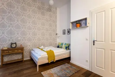 Ein Bett oder Betten in einem Zimmer der Unterkunft Compact Studio Near Center by HM