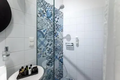 Ein Badezimmer in der Unterkunft Compact Studio Near Center by HM