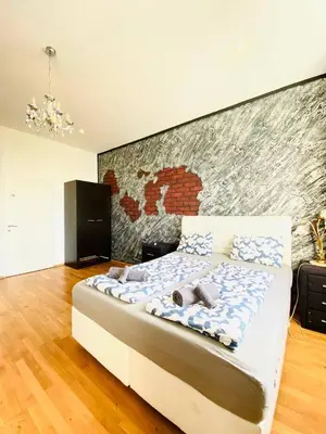 Ein Bett oder Betten in einem Zimmer der Unterkunft W Apartment - Brigittenau Area MM28