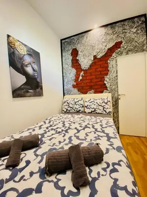 Ein Bett oder Betten in einem Zimmer der Unterkunft W Apartment - Brigittenau Area MM28