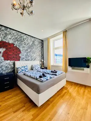 Ein Bett oder Betten in einem Zimmer der Unterkunft W Apartment - Brigittenau Area MM28