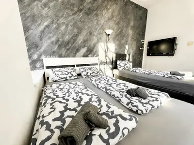 Ein Bett oder Betten in einem Zimmer der Unterkunft W Apartment - Brigittenau Area MM7