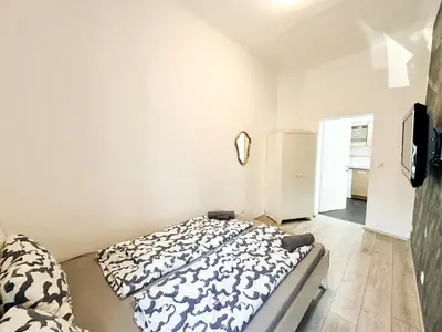 Ein Bett oder Betten in einem Zimmer der Unterkunft W Apartment - Brigittenau Area MM7