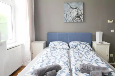 Ein Bett oder Betten in einem Zimmer der Unterkunft W Apartment - Brigittenau Area MM15