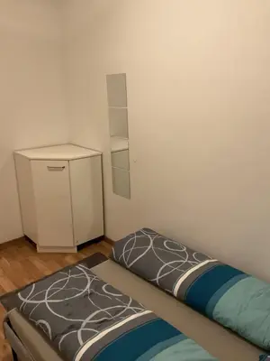 Ein Bett oder Betten in einem Zimmer der Unterkunft Palace Apartment