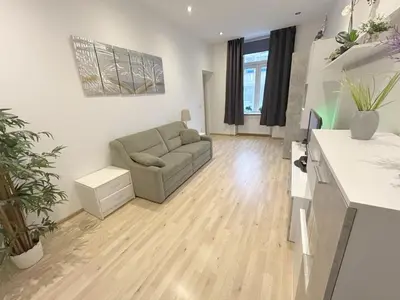 Ein Sitzbereich in der Unterkunft Vienna City Apartment - Stadthalle