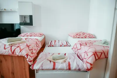 Ein Bett oder Betten in einem Zimmer der Unterkunft Raimond Apartment Top 12