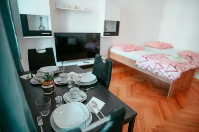 Ein Bett oder Betten in einem Zimmer der Unterkunft Raimond Apartment Top 12
