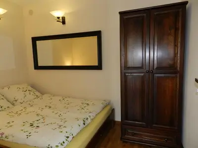 Ein Bett oder Betten in einem Zimmer der Unterkunft Wile West Apartments