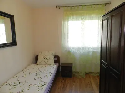 Ein Bett oder Betten in einem Zimmer der Unterkunft Wile West Apartments