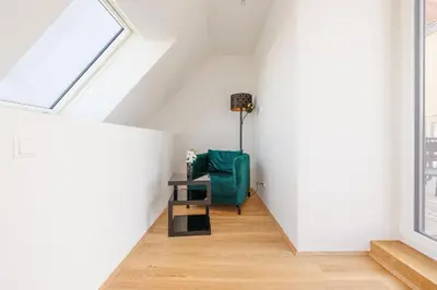 Ein Sitzbereich in der Unterkunft SYMPHONY Apartments 42 - Modern Loft with Terrace and Grill in Central Location