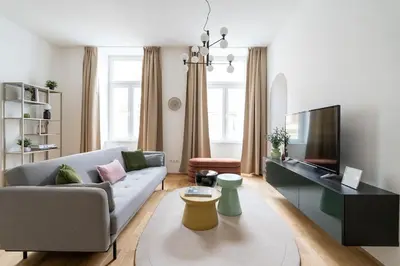 TV/Unterhaltungsangebot in der Unterkunft Elegant 1BR Suite, City Close by HM