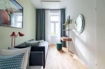 Ein Sitzbereich in der Unterkunft Vogue 2BR Suite, Near City Pulse by HM