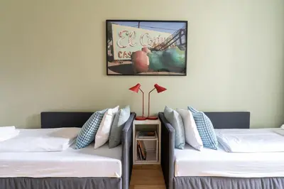 Ein Bett oder Betten in einem Zimmer der Unterkunft Vogue 2BR Suite, Near City Pulse by HM