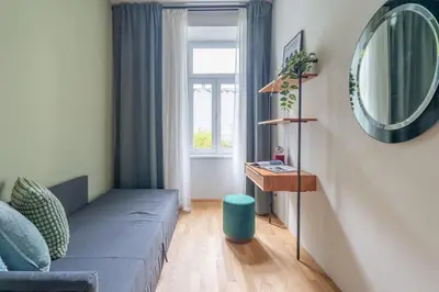 Ein Sitzbereich in der Unterkunft Vogue 2BR Suite, Near City Pulse by HM