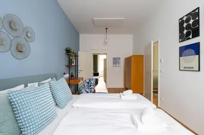 Ein Bett oder Betten in einem Zimmer der Unterkunft Vogue 2BR Suite, Near City Pulse by HM