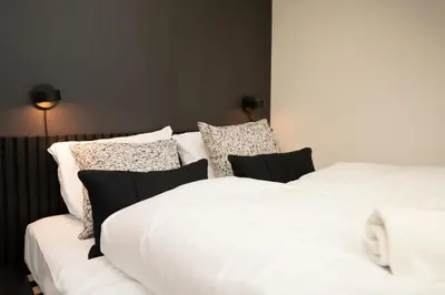 Ein Bett oder Betten in einem Zimmer der Unterkunft josef's home I Penthouse I Balcony & City Views