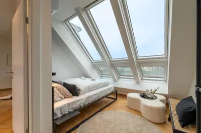 Ein Sitzbereich in der Unterkunft josef's home I Penthouse I Balcony & City Views