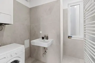 Ein Badezimmer in der Unterkunft FeelHome-Balkon-Zentrum-6 Gäste-WiFi-Smart TV