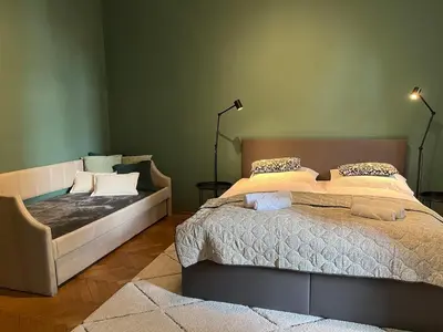 Ein Bett oder Betten in einem Zimmer der Unterkunft Großzügiger Wiener Altbau gleich neben Schönbrunn