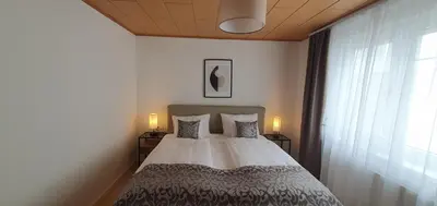 Ein Bett oder Betten in einem Zimmer der Unterkunft Zentrum 7 Mörbisch