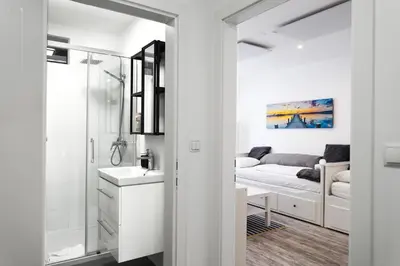 Ein Badezimmer in der Unterkunft Modernes Studio im Zentrum 4 Personen