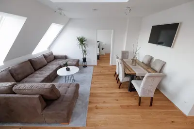 Ein Sitzbereich in der Unterkunft SYMPHONY Apartments 39 - Modern Loft with Terrace and Grill in Central Location