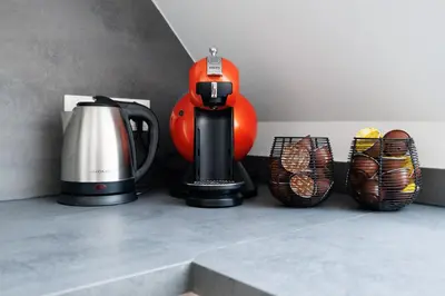 Kaffee-/Teezubehör in der Unterkunft SYMPHONY Apartments 39 - Modern Loft with Terrace and Grill in Central Location