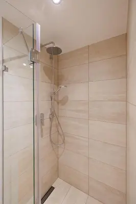 Ein Badezimmer in der Unterkunft SYMPHONY Apartments 40 - Modern Loft with Terrace and Grill in Central Location