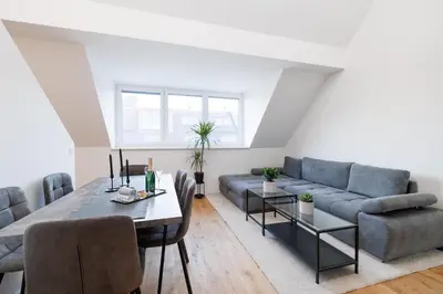 Ein Sitzbereich in der Unterkunft SYMPHONY Apartments 41 - Modern Loft with Terrace and Grill in Central Location