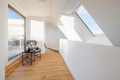Ein Sitzbereich in der Unterkunft SYMPHONY Apartments 41 - Modern Loft with Terrace and Grill in Central Location