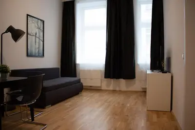 Ein Sitzbereich in der Unterkunft Klimt Apartments