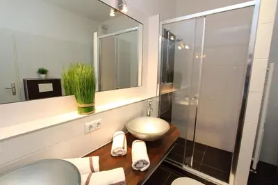 Ein Badezimmer in der Unterkunft Klimt Apartments