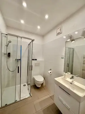 Ein Badezimmer in der Unterkunft Klimt Apartments