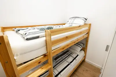 Ein Bett oder Betten in einem Zimmer der Unterkunft Getreide T8