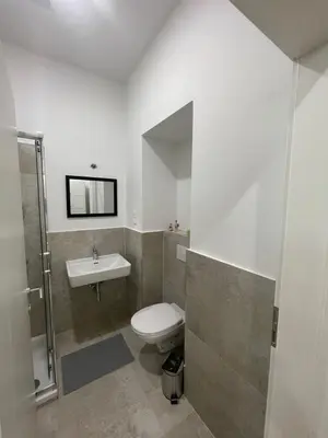 Ein Badezimmer in der Unterkunft New Apartment with Balcony 11